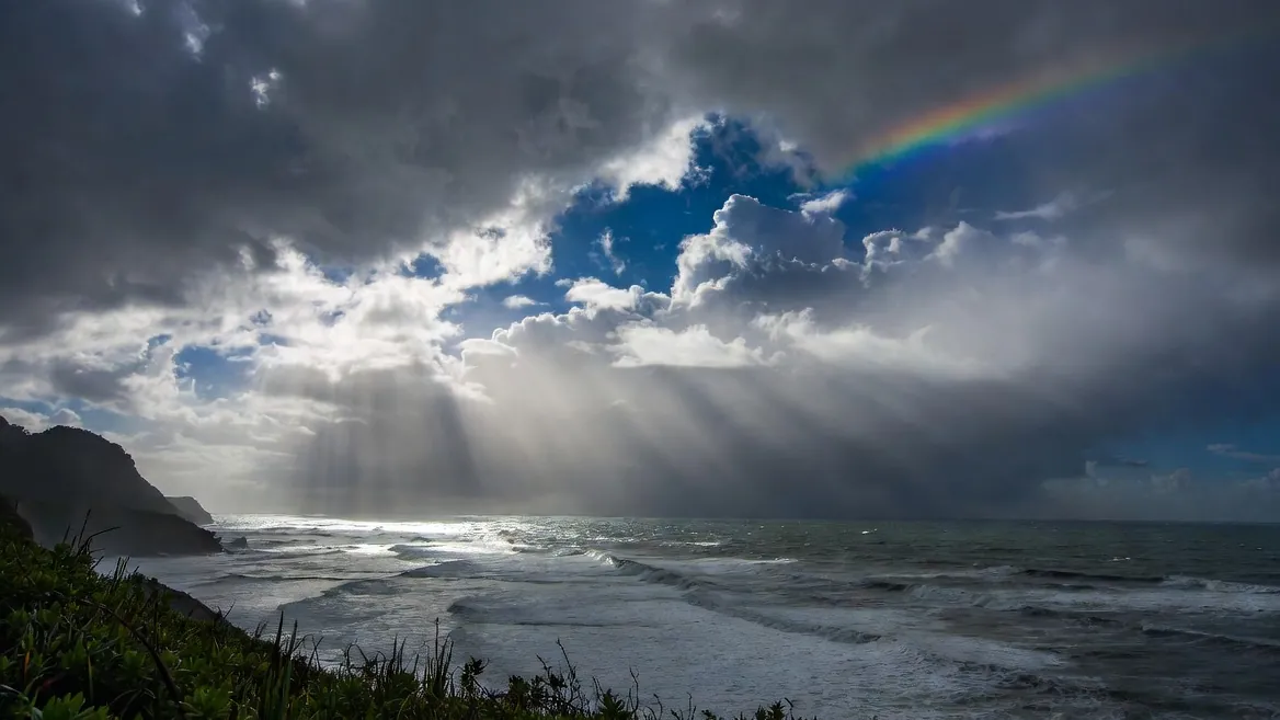 October's clearing storms: god-rays, leftover swell and a rinsed-clean town